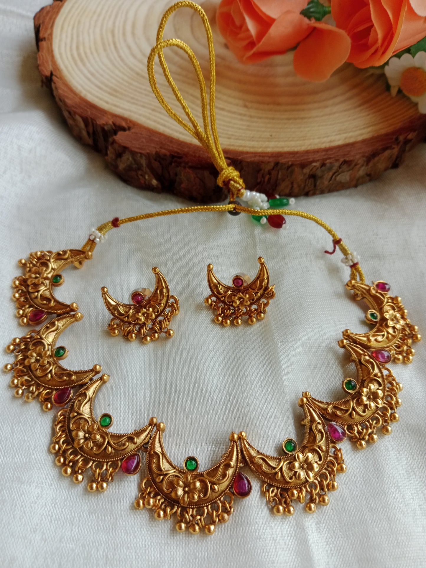 Antique Gold Crescent Floral Necklace Set with Ruby & Emerald Stones and Ghungroo Drops
