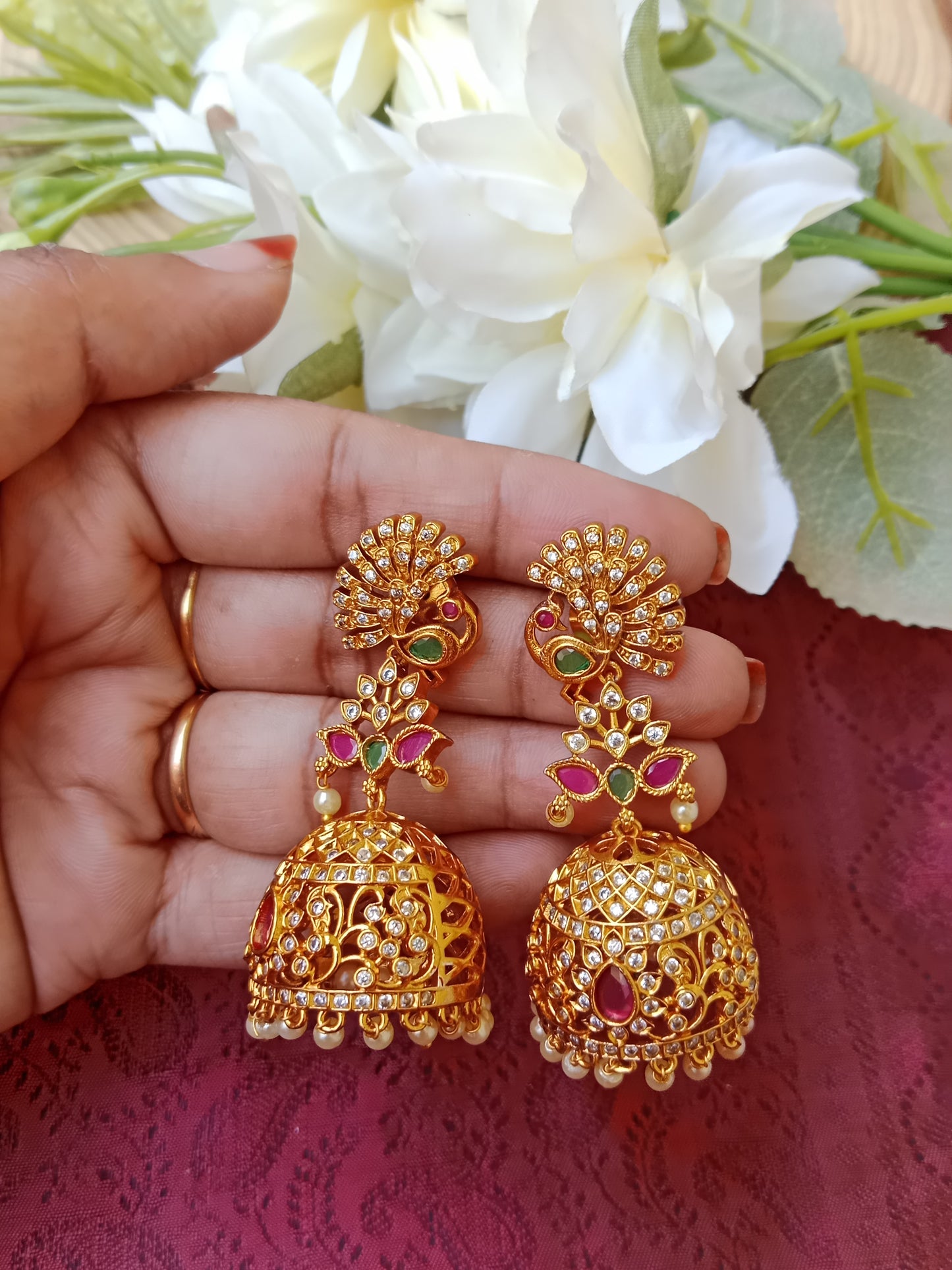 Gold Plated AD Peacock Jhumka Earrings with Ruby Emerald & Pearl Drops
