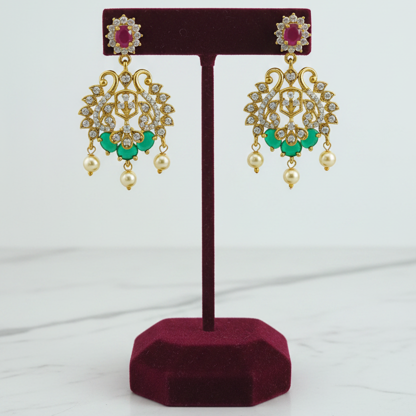 Earrings on burgundy velvet stand