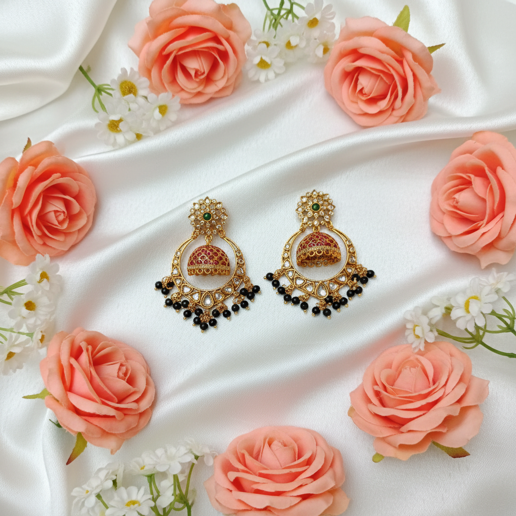 Earrings on white satin with flowers