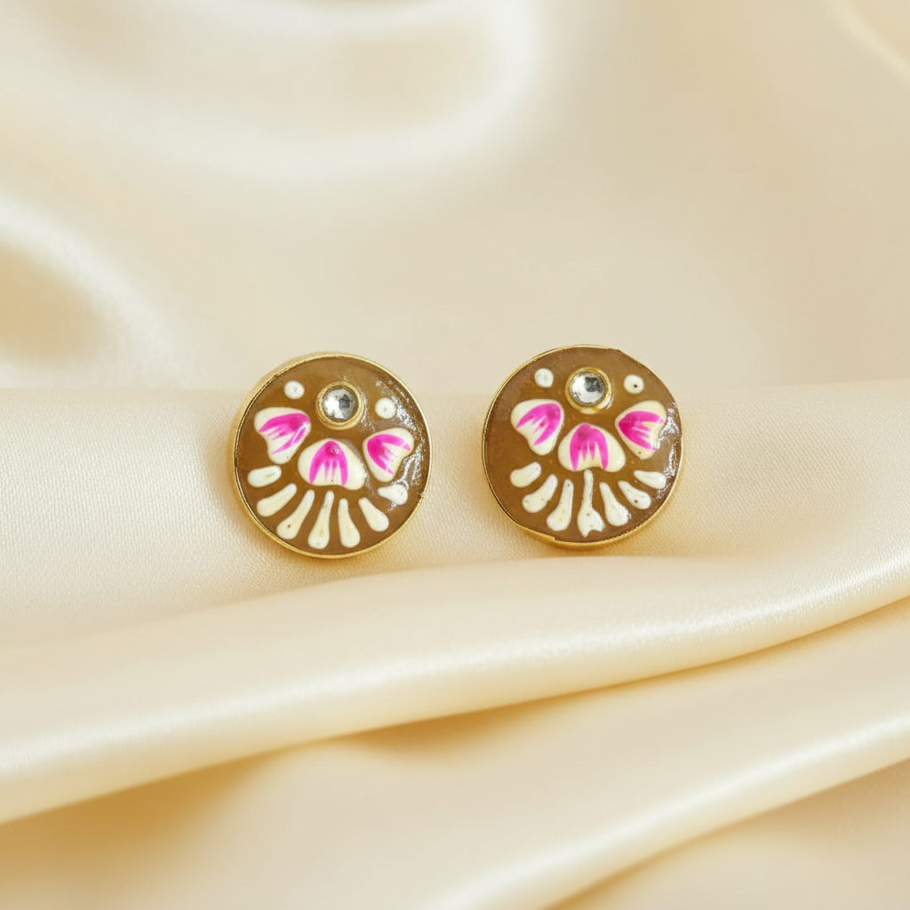 Golden brown meenakari studs on ivory cream silk